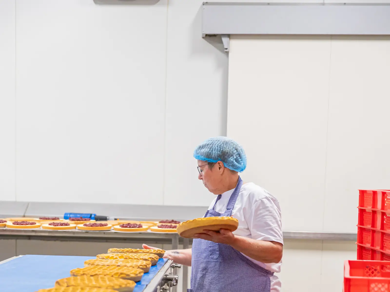 Team van Bakkerij De Haas in bedrijfskleding